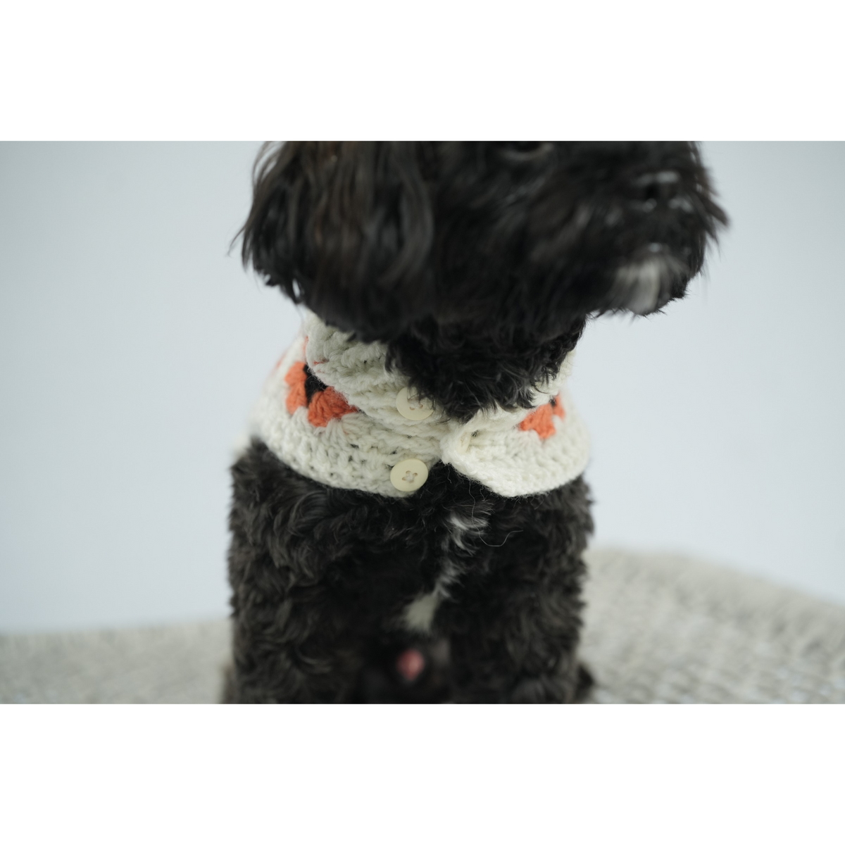 Knitted orange floral sweater